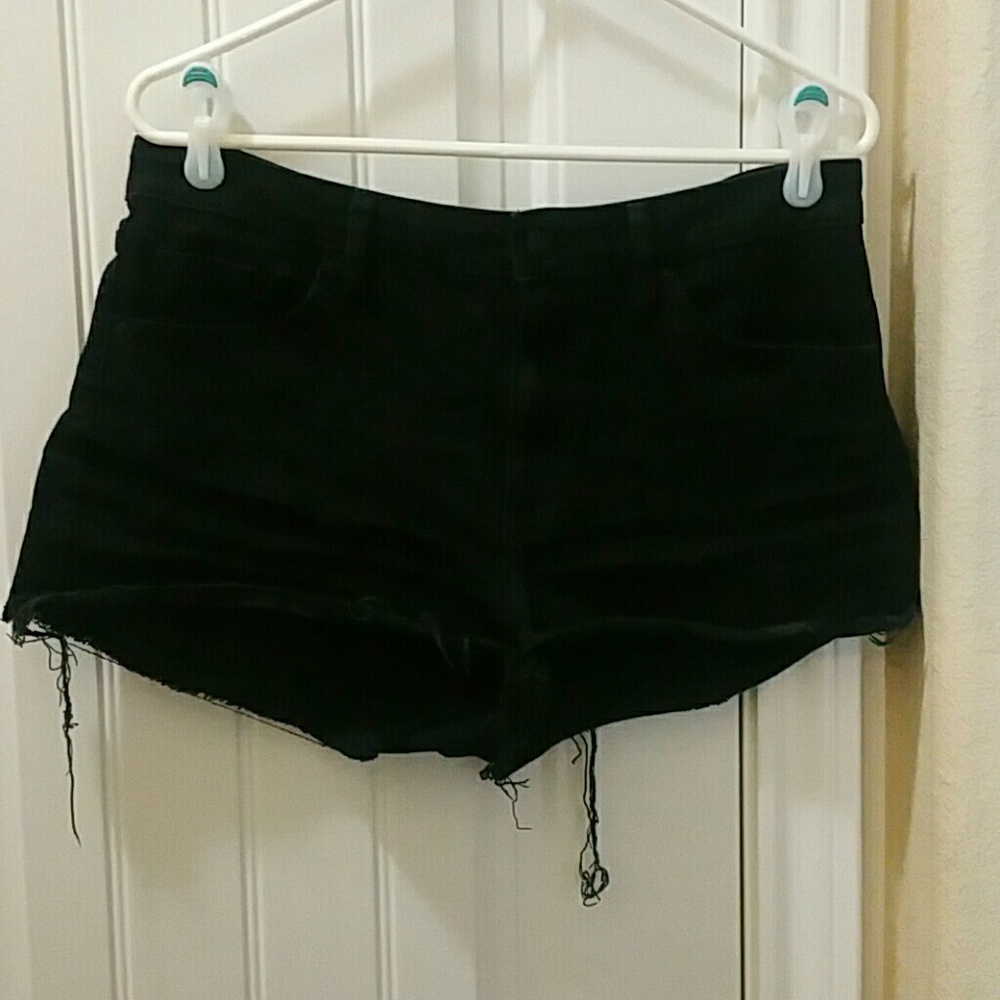 Black ripped shorts